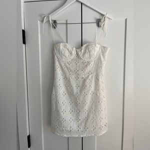 Super light weight white mini dress with tie straps. Size small